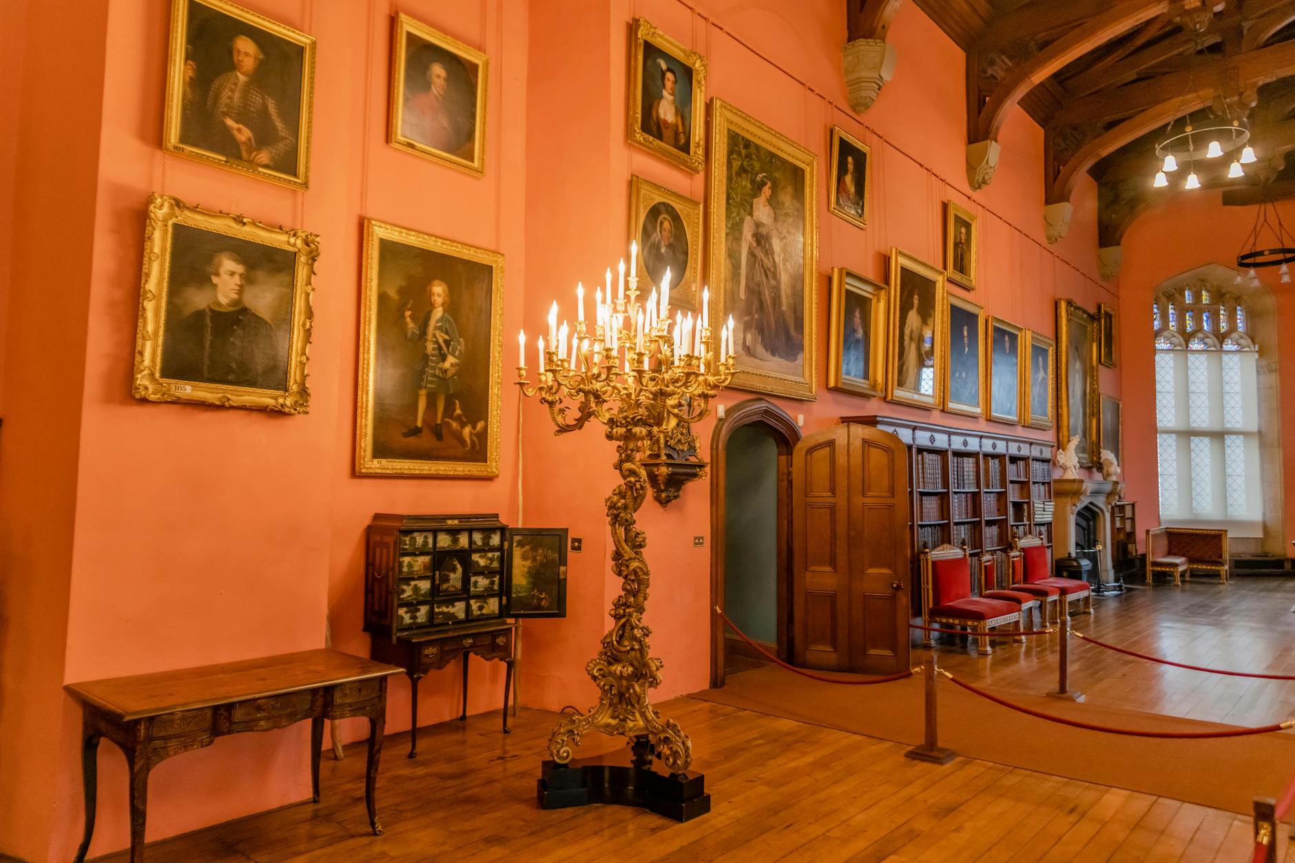 Within Stone and Shadow The Enduring Spell of Castle Interiors 4 - Grand Boudoir Elegant interior of Raby Castle showcasing antique furniture and classic paintings.