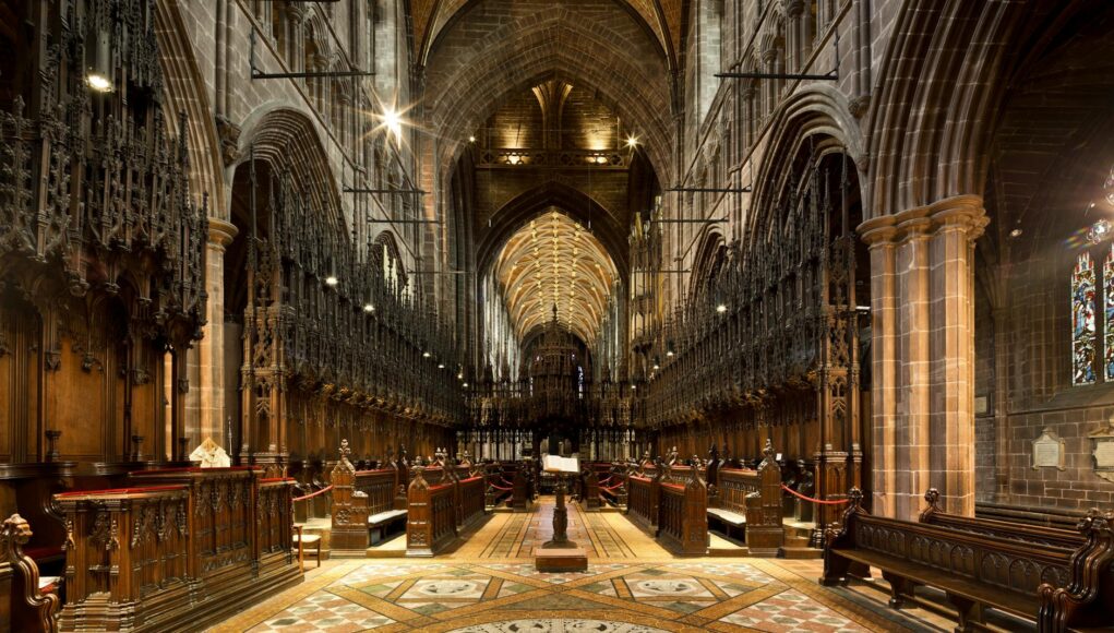 gothic cathedral interior light beams Capture of Chester Cathedral's intricate Gothic architecture and historic charm.