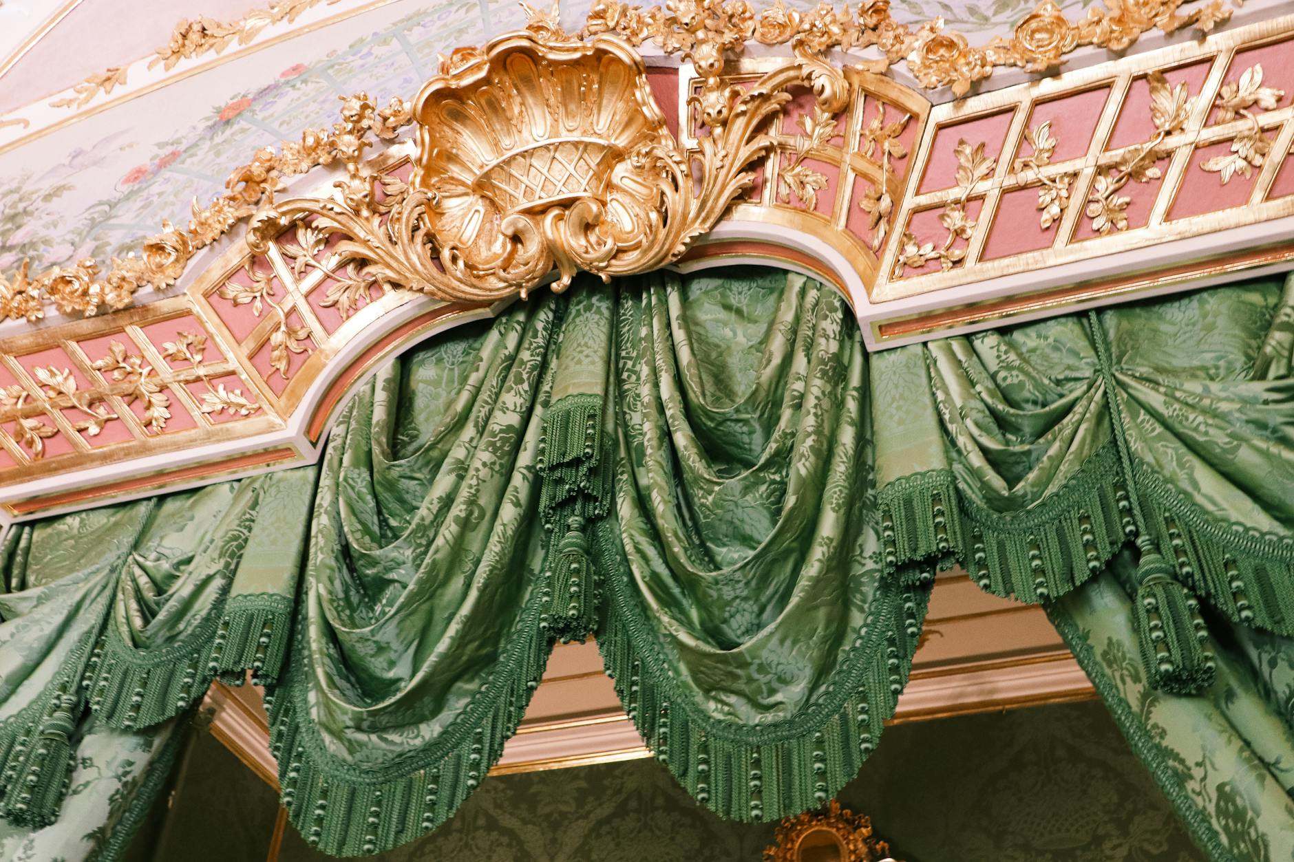 pexels photo 9307312 - Grand Boudoir Luxurious green drapes with ornate gold detailing in a classic interior setting.