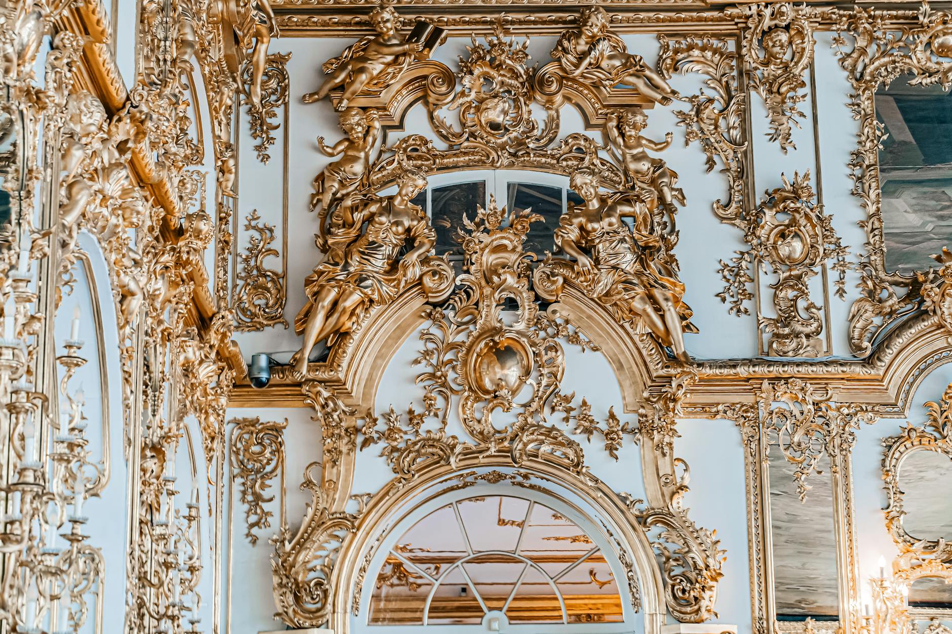 rococo room 3 - Grand Boudoir Luxurious gold decorations in a baroque palace interior showcasing intricate architectural details.