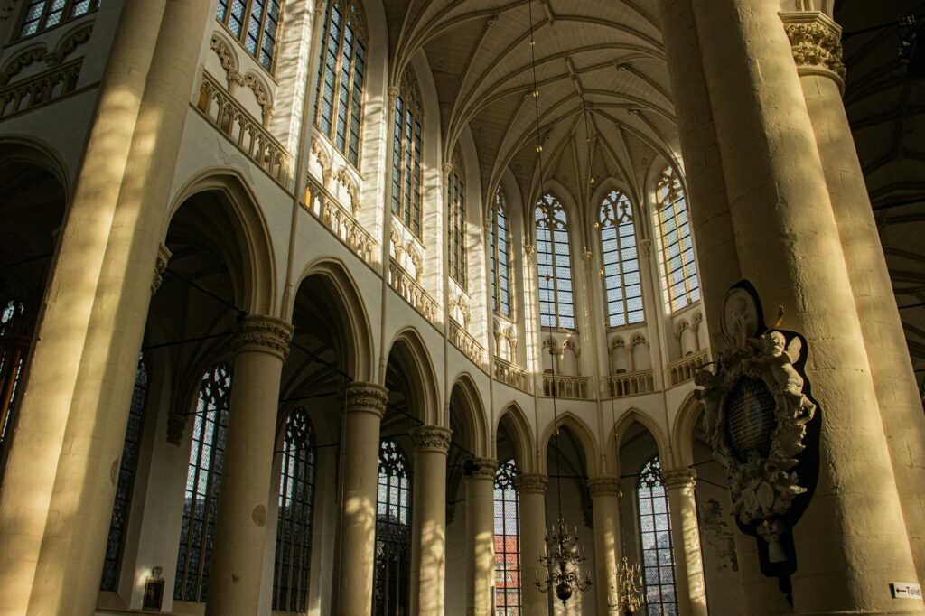 stained glass sunlight cathedral - Grand Boudoir Cathedrals of Shadow and Light: The Enduring Spell of Gothic Awe