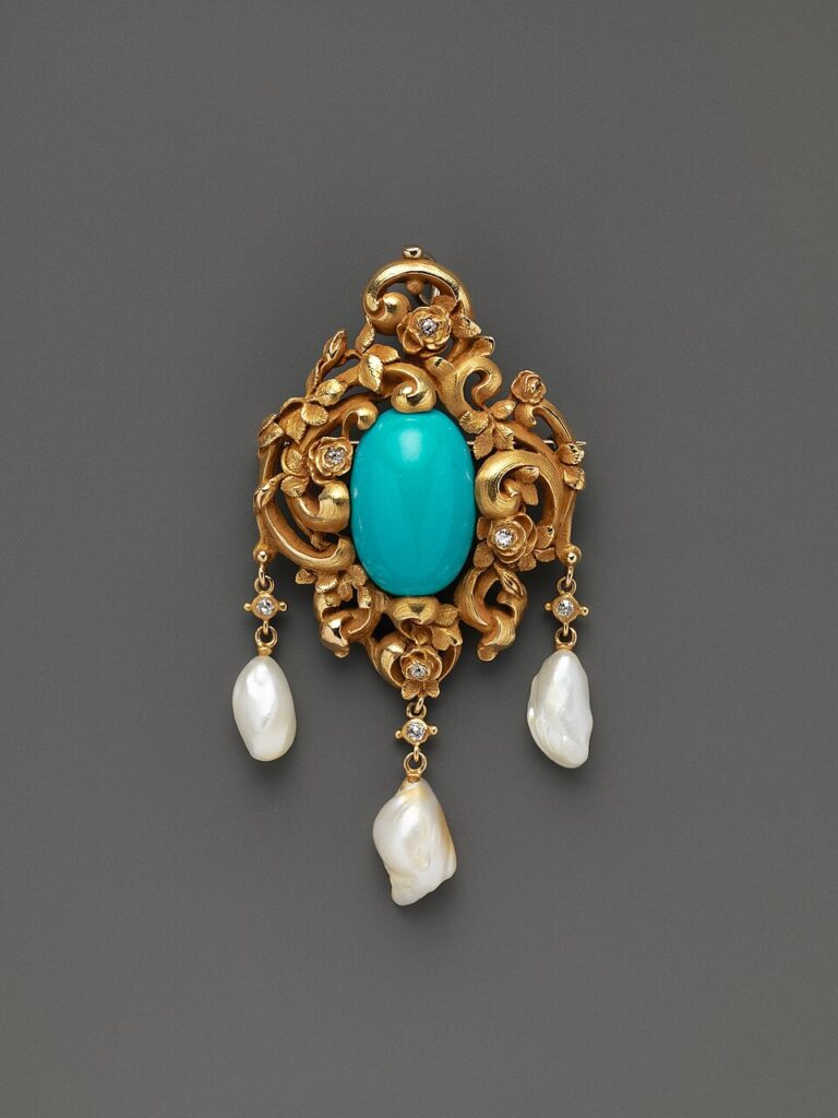Brooch MET DP286969 - Grand Boudoir Discover the secrets hidden in a Victorian turquoise brooch—romance, status, and symbolism captured in a single, luminous blue gem.