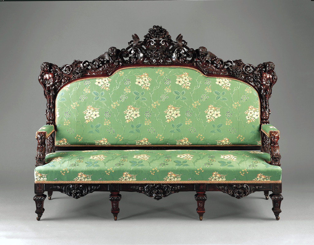Discover how the opulent curves and gilded details of a French Rococo sofa can instantly transform your living room into a royal salon