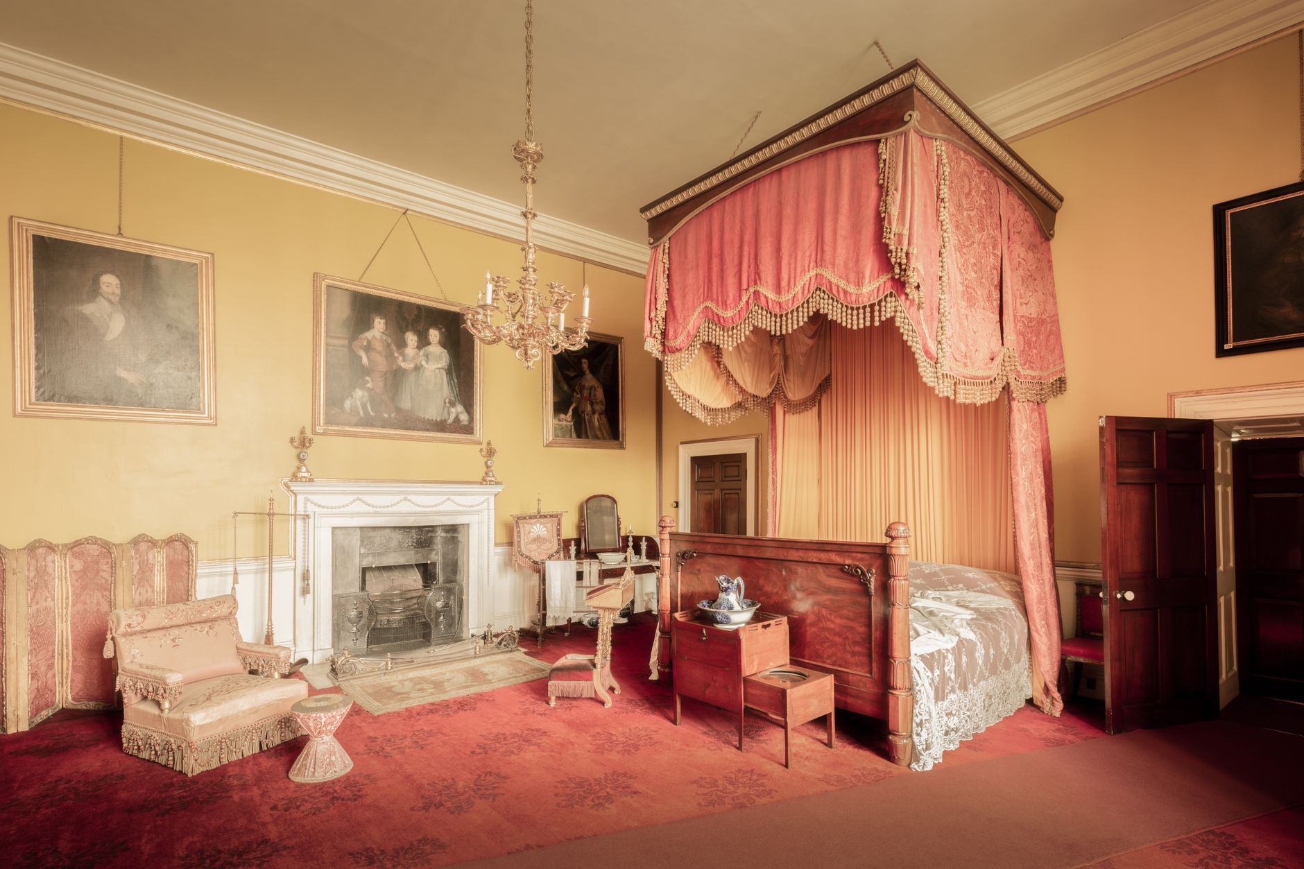 pexels photo 36099150 - Grand Boudoir Classic vintage bedroom with a canopy bed and antique furnishings.
