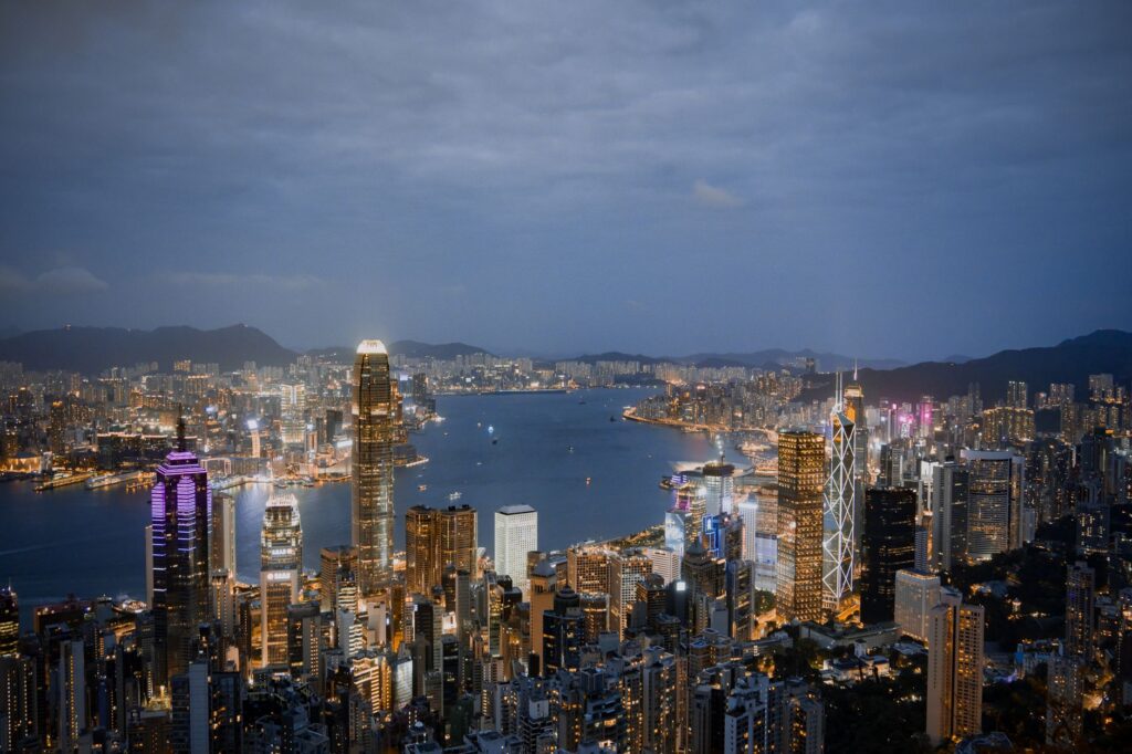 pexels photo 18093482 - Grand Boudoir A breathtaking view of Hong Kong's illuminated skyline and harbor at night.